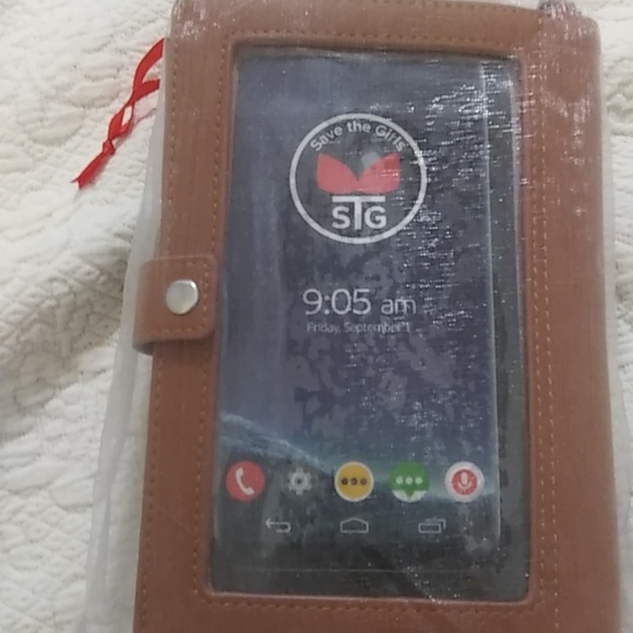 STG hand purse with shoulder strap and slip to put phone. Never used - Picture 1 of 12